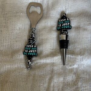 Silver and Black Bottle Opener and Stopper Set